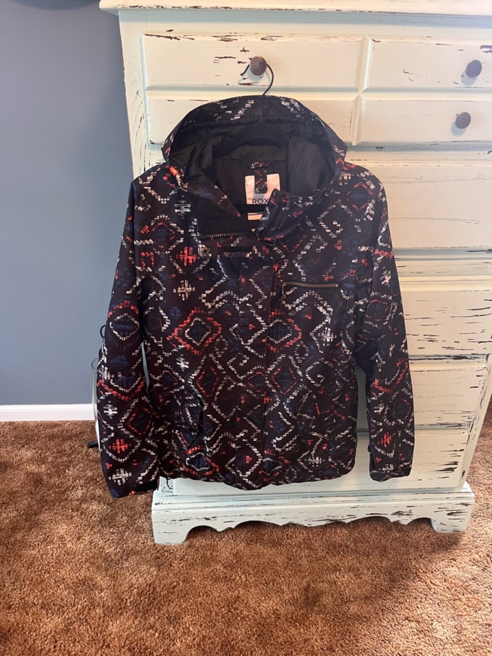 Roxy Women’s Snowboarding Jacket with Tribal pattern. Size medium.